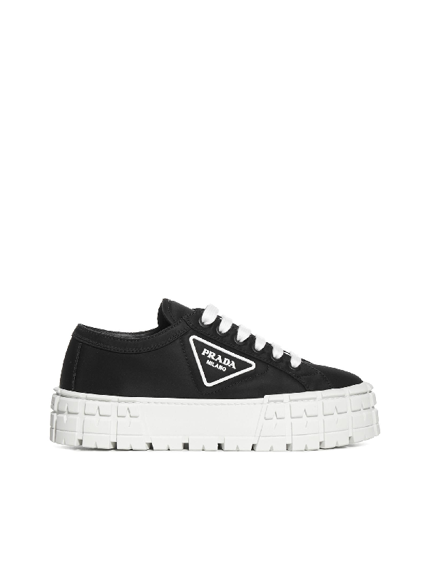 black sole platform sneakers
