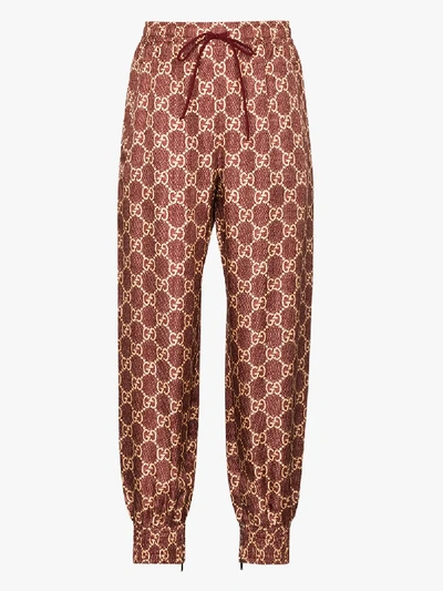 Shop Gucci Gg Supreme Canvas Track Pants - Women's - Silk/cotton/polyester/viscose In Red