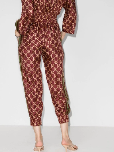 Shop Gucci Gg Supreme Canvas Track Pants - Women's - Silk/cotton/polyester/viscose In Red