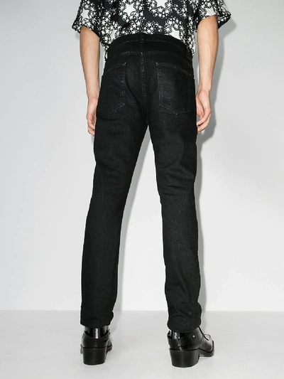Shop Saint Laurent Five Pocket Skinny Jeans In Black