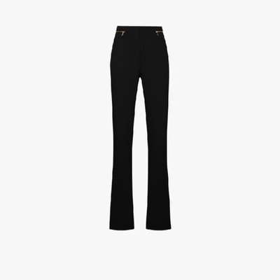 Shop Versace Zipped Flared Wool Trousers In Black