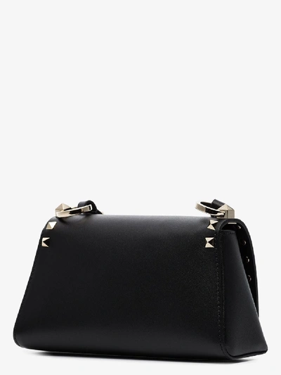 Shop Valentino Black Rockstud Mini Leather Cross Body Bag