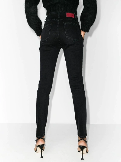 Shop Alessandra Rich Crystal Button Skinny Jeans In Black