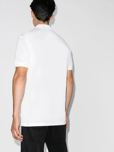 Shop Ferragamo Logo Print Polo Shirt In White