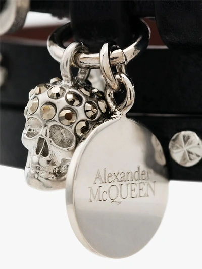 Shop Alexander Mcqueen Black Studded Skull Wrap Leather Bracelet