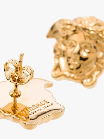 Shop Versace Gold Tone Medusa Earrings