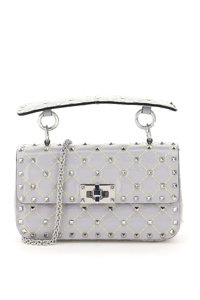 Shop Valentino Small Rockstud Spike Patent Bag In Grey,yellow