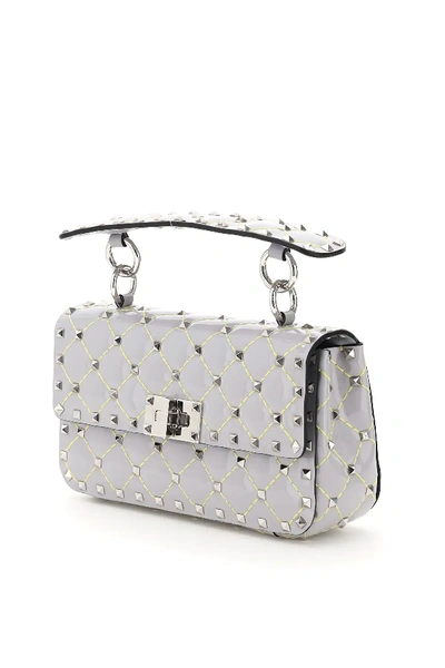 Shop Valentino Small Rockstud Spike Patent Bag In Grey,yellow