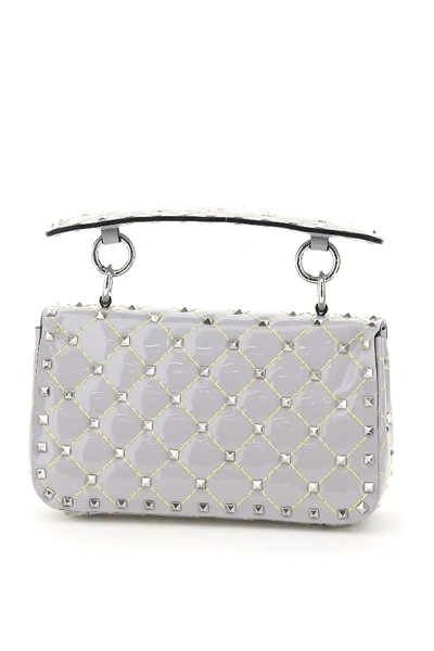 Shop Valentino Small Rockstud Spike Patent Bag In Grey,yellow