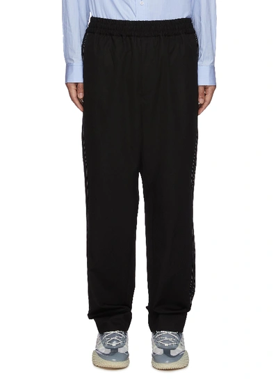 Shop Oamc Contrast Side Stitch Elastic Waist Pants In Black