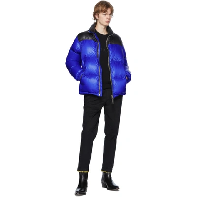 Shop Moschino Blue And Black Down Logo Jacket In A1298 Blue