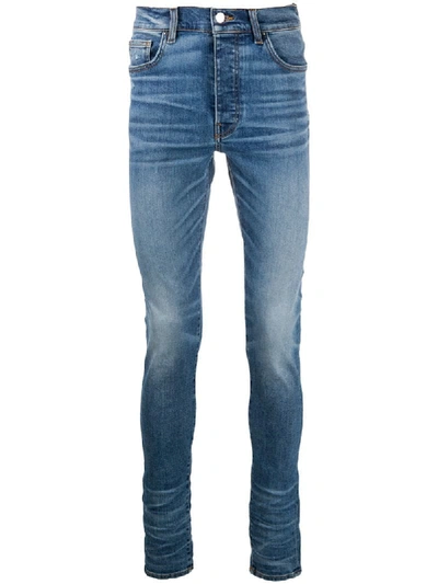 Shop Amiri Washed Skinny Jeans In Blue