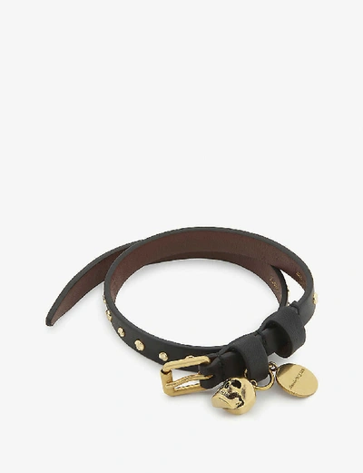 Shop Alexander Mcqueen Leather And Brass Skull Wrap Bracelet In Black