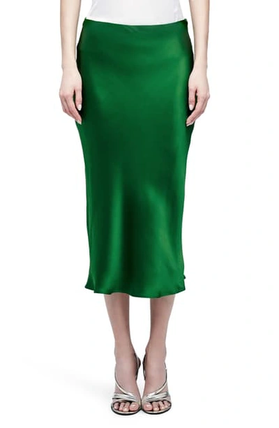 Shop L Agence Perin Bias Cut Silk Satin Midi Skirt In Treetop