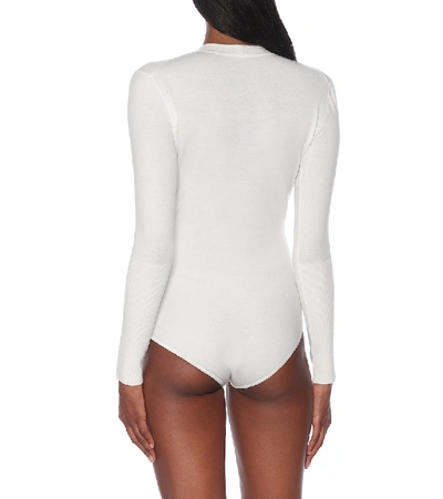 Shop Alaïa Wool-blend Bodysuit In White