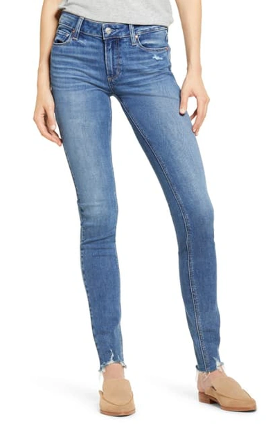Shop Paige Leggy Distressed Ultra Skinny Jeans In Axton Distressed Peak Hem