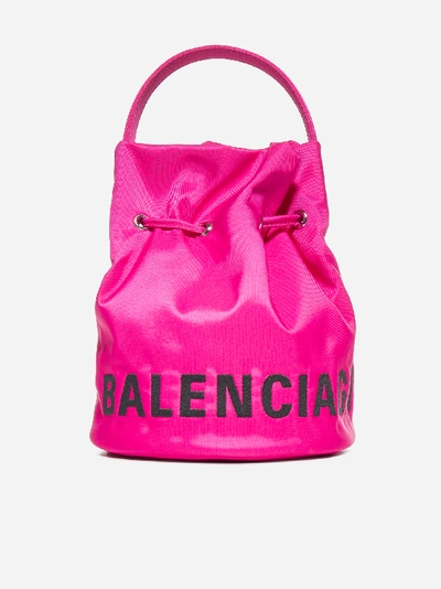 Shop Balenciaga Wheel Xs Nylon Bucket Bag In Fuchsia