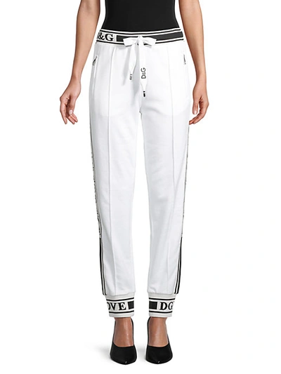 Shop Dolce & Gabbana Logo Tape Sweatpants In White