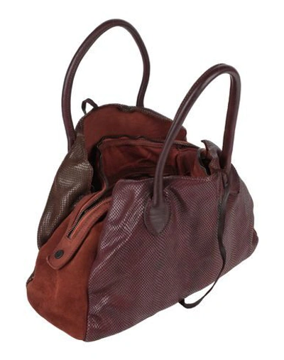 Shop Caterina Lucchi Handbag In Maroon