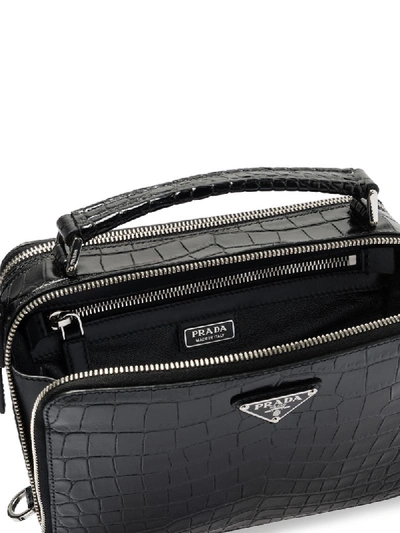 Shop Prada Embossed Crocodile Effect Messenger Bag In Black