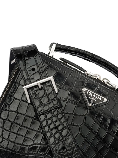 Shop Prada Embossed Crocodile Effect Messenger Bag In Black