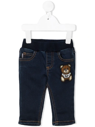 Shop Moschino Embroidered Teddybear Jeans In Blue