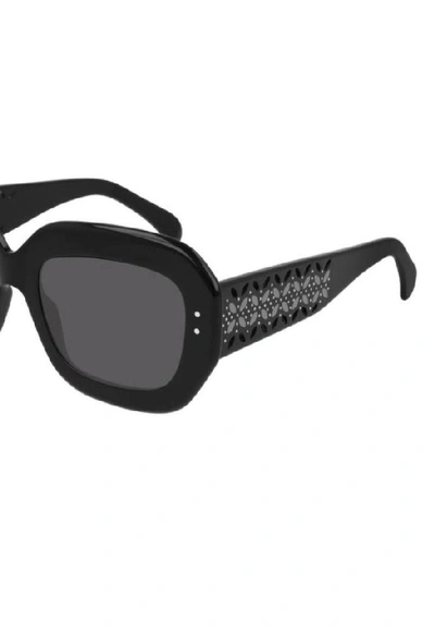 Shop Alaïa Women's Black Metal Sunglasses