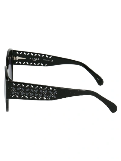 Shop Alaïa Women's Black Metal Sunglasses