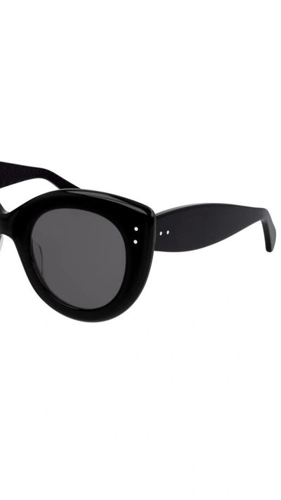 Shop Alaïa Women's Black Metal Sunglasses