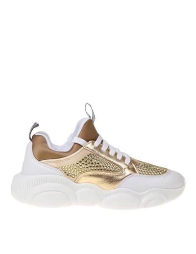 Shop Moschino Women's Gold Leather Sneakers