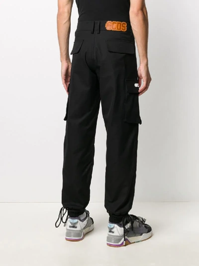 Shop Gcds Cargo Pocket Trousers In Black