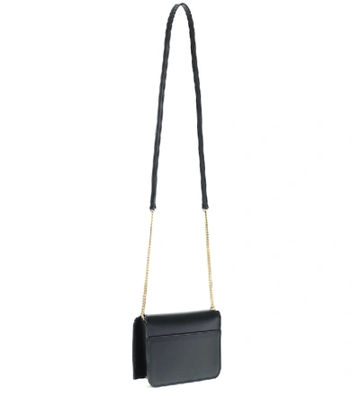 Shop Saint Laurent Cassandre Leather Phone Pouch In Noir