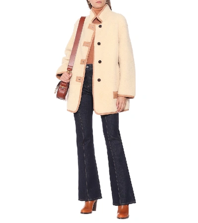 Shop Chloé Shearling Coat In White