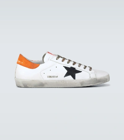 Shop Golden Goose Distressed Superstar Sneakers In White