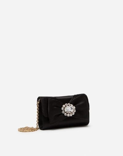 Shop Dolce & Gabbana Satin Microbag With Jewel Bow In Black