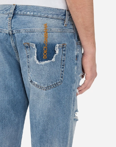 Shop Dolce & Gabbana Loose Jeans With Small Abrasions In Blue