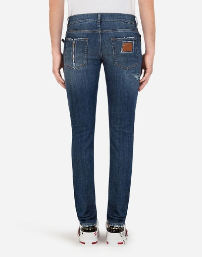 Shop Dolce & Gabbana Skinny Stretch Jeans With Zipper