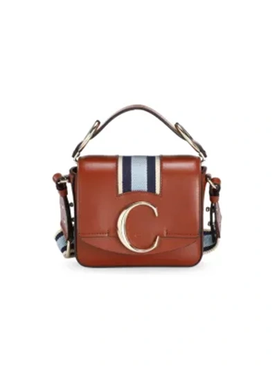 Shop Chloé Mini  C Leather Crossbody Bag In Sepia Brown