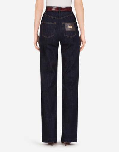 Shop Dolce & Gabbana Flared Deep Blue Denim Jeans