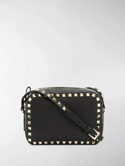 Shop Valentino Rockstud Crossbody Bag In Black