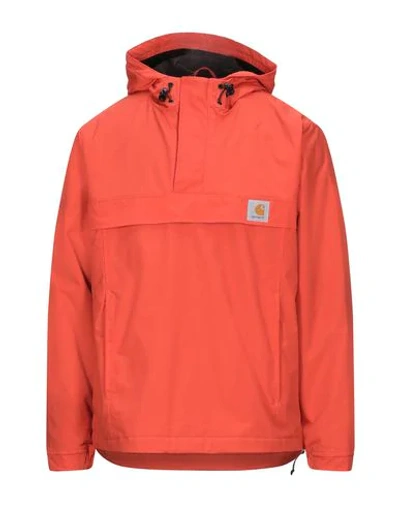 Shop Carhartt Jackets In Orange