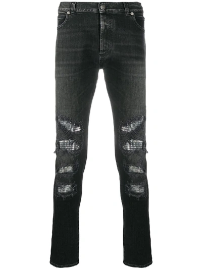 Shop Balmain Embellished Slim-fit Jeans In Black