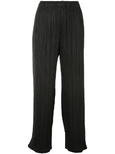 Shop Issey Miyake Pleated Wide-leg Trousers In Black