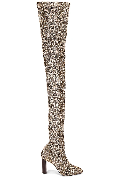 Shop Saint Laurent Moon Boots In Beige Vintage