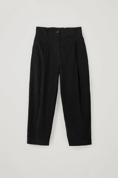 Shop Cos Cotton Wide-leg Pleated Cord Trousers In Black