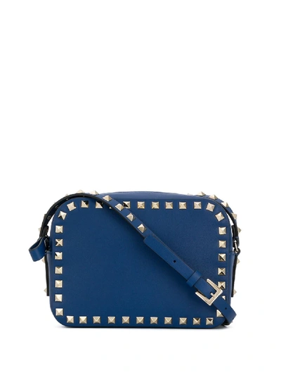 Shop Valentino Rockstud Leather Crossbody Bag In Blue