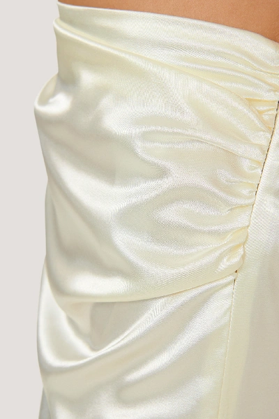 Shop Danaë X Na-kd Side Slit Satin Skirt - Offwhite In Light Beige