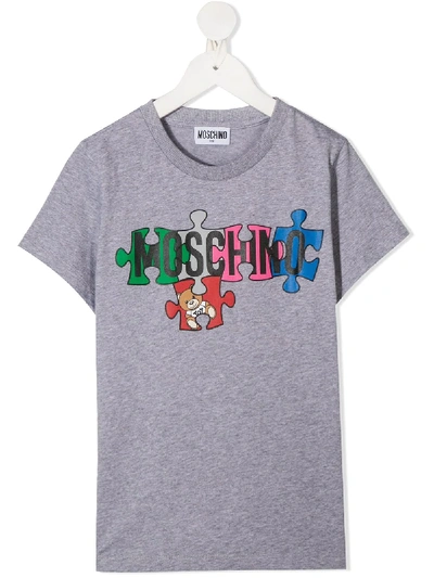 Shop Moschino Logo Puzzle-print T-shirt In Grey