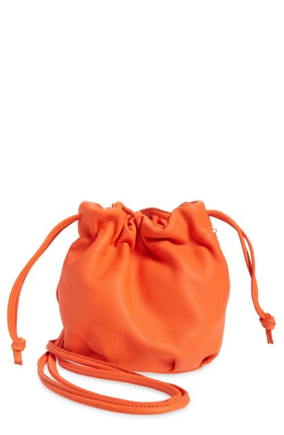Shop Clare V Emma Leather Drawstring Bucket Bag In Blood Orange