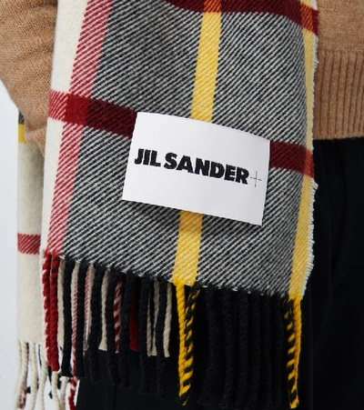 Shop Jil Sander Checked Blanket Wool Scarf In Multicoloured